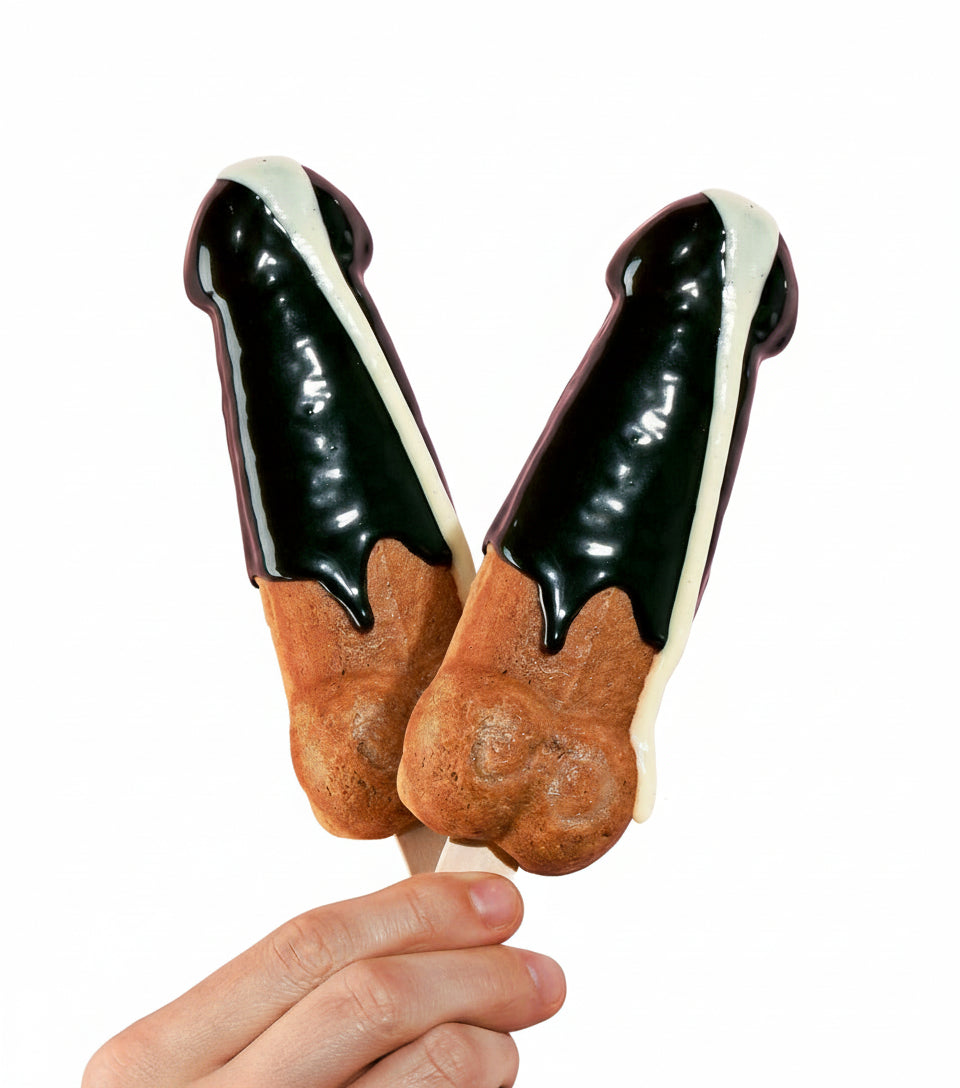 Two sugar wood Woody waffles dripping with sauce